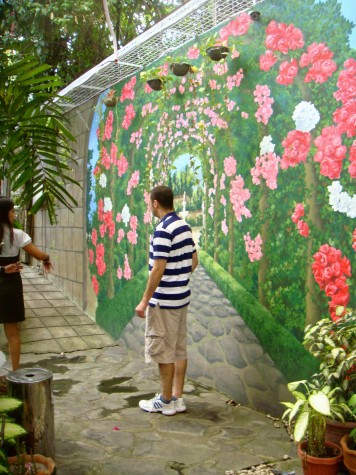 The "Garden Wall" nearby to the restrooms where guests can lounge to get away from all the party action for a while.   They also have a wheelchair ramp next to it. And there is my fiancé getting into the details with their Account Representative while i take some photos. :)